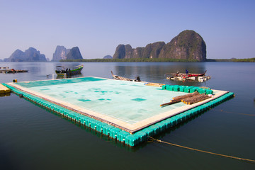 floating football field. James Bond Island, PhangNga by regarded as one of the most beautiful in the world -  has  been the focus of many children in the village -Unseen Thailand  - Public Landmarks 