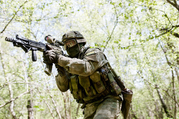 Fototapeta premium Military man with submachine gun