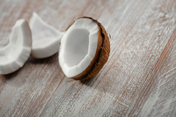 Fototapeta na wymiar coconut isolated on a wooden background