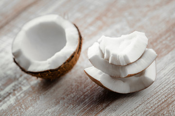 Fototapeta na wymiar coconut isolated on a wooden background
