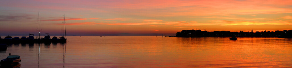 Fototapeta na wymiar Sunset in small coastal town Stobrec near Split, Croatia. 