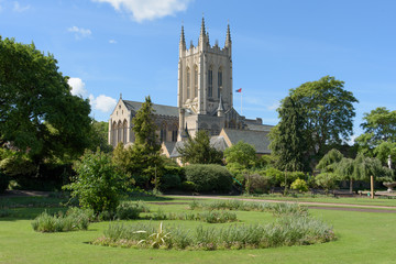 Fototapeta na wymiar St Edmundsbury Cathedral with flower borders in foreground