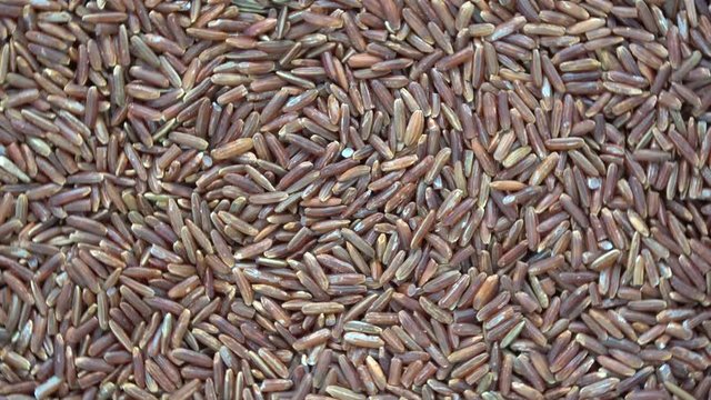 Rotating red rice food background