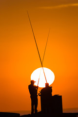 Fishermen Beach Sunrise Silhouetted