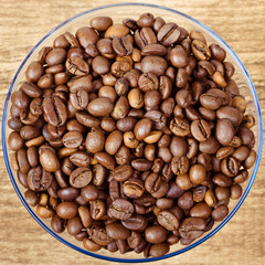 Coffee beans in saucer