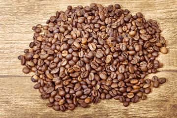Coffee beans on wooden Board