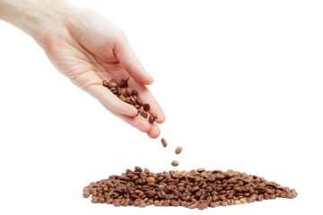 Hand and coffee beans