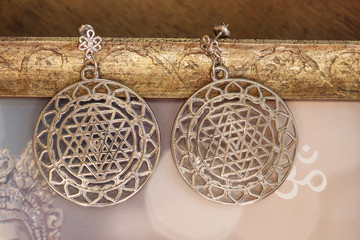 Esoteric earrings with sacred geometry