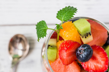 Fresh fruit salad in glass. CLose up