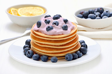 Pancakes with fruit yogurt and blueberry