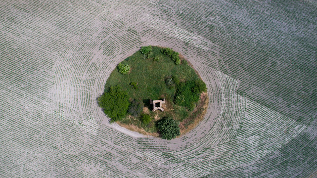 Aerial view from hungary, field with ruin churc