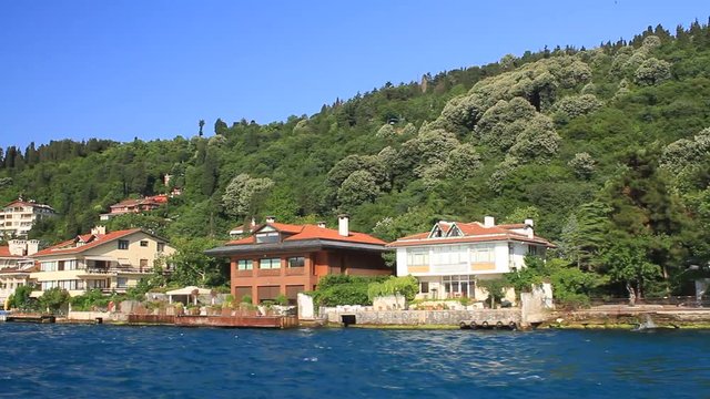 Seaside cottages and Vanikoy Mosque. Kandilli region in Istanbul, Turkey. Traditional Turkish residence architecture along Bosphorus Seaside 