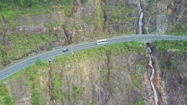 Aerial View Modern Highway and Waterfall between Rocks