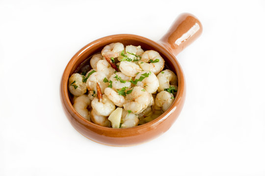 Garlic prawns served in a clay pot