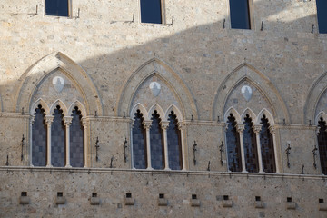 Facade detail of the Salimbeni Palace, Banca Monte dei Paschi di Siena. Siena, Tuscany, Italy.
