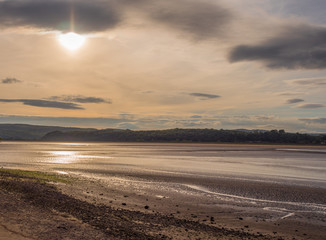 Beautiful early summer evening sunset over the beach and water at Arnside, Lancashire, UK