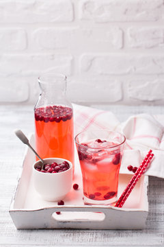 refreshing cocktail with cranberry and ice