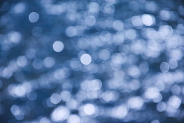 Obraz premium Water shining waves, bokeh background