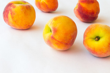 Peaches  on white background. Close up.