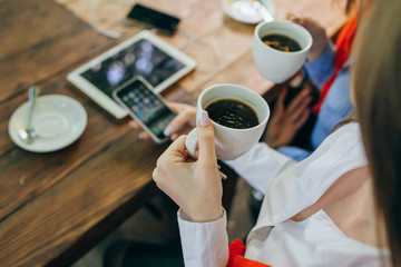 two girls in a cafe
