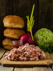 chopped meat On the kitchen board (back plan burgers for burgers)