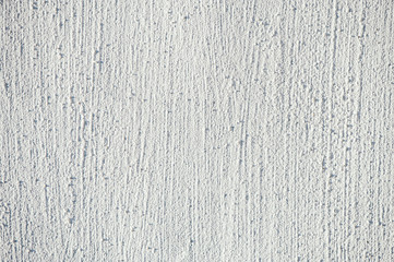 White embossed texture of the painted wall. Pattern.
