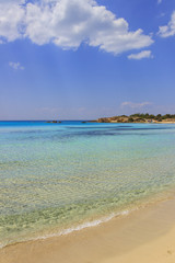 Summer seascape,Apulia coast: Marina di Pulsano beach (Taranto). The coastline is characterized by a alternation of sandy coves and jagged cliffs overlooking a truly clear and crystalline sea.