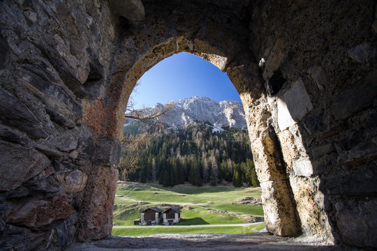 Fototapeta Looking out of the window of the Splugen castle ruin, Switzerland
