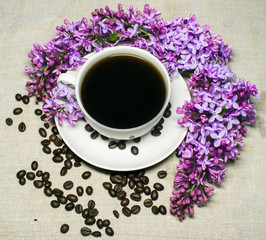 Obraz na płótnie Canvas Good morning! Lilac flowers and coffee