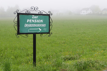 bilingual iron information board to a boardinghouse