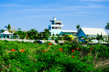 Tropical island coast with houses and buildings Asia Philippines