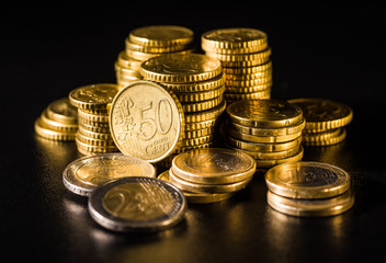 Euro coins.Coins stacked on each other in different positions. Money concept
