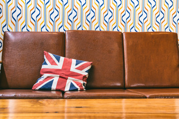 union jack flag pillow on brown sofa,pillow decoration object