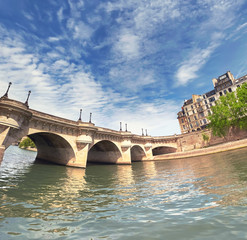 Fototapeta premium Pont Neuf bridge on Seine river in Paris, France