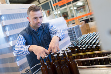 Man in bottling plant