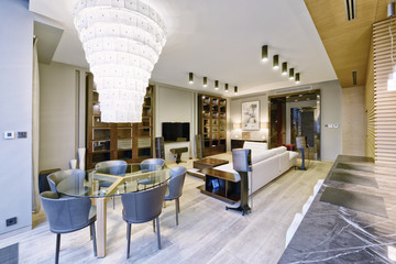 Russia, Moscow region - interior design kitchen - living room in luxury new apartment.