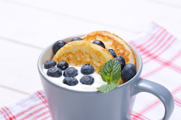 american pancakes with yogurt and blueberries