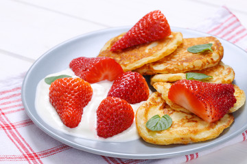 american pancakes with yogurt and strawberries