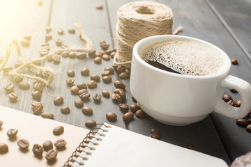 black coffee beans on black background