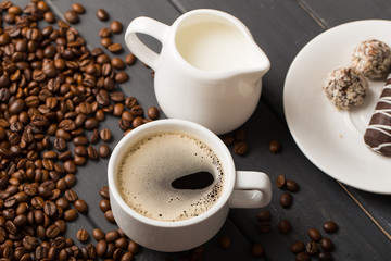 black coffee beans on black background