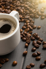 black coffee beans on black background