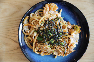 Yakisoba pork on wood , Japanese food