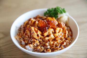 salmon sushi rice don with spicy sauce