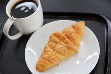 Croissant with coffee