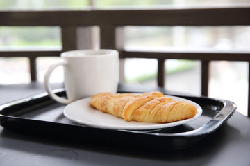 Croissant with coffee