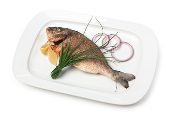 dish of fried fish with onions