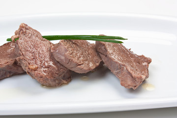 dishes of roast meat