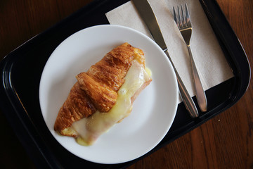 Croissant Ham cheese on wood