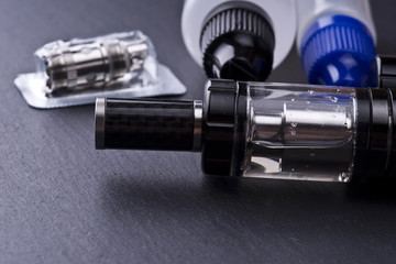 modern vaporizer boxmod e-cig device on grey background