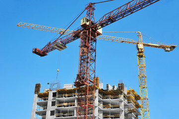 Crane and highrise construction site